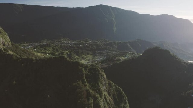 Aerial view of beautiful township among the mountains of Hell Bourg, Saint Benoit, Reunion.