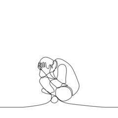 frustrated man sitting on floor clutching his head, his elbows rest on crossed legs - one line drawing. the concept of a person with mental problems or unsolvable life circumstances