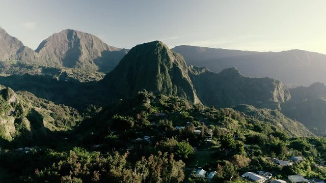 Aerial view of beautiful township among the mountains of Hell Bourg, Saint Benoit, Reunion.