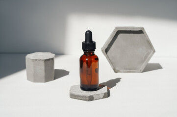 Front view of face serum with concrete.