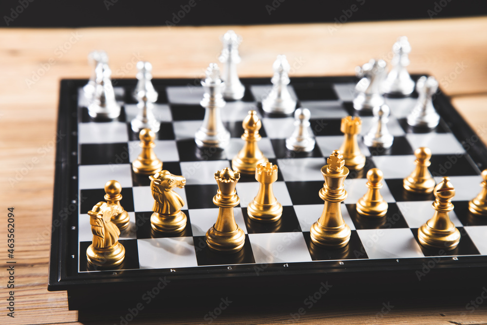 Wall mural gold and silver chess pieces