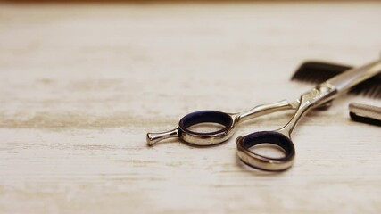 The tools of a hair dresser on a hair salon table.  Slider Move