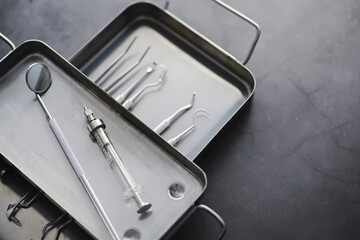 Equipment for the dental office. Orthopedic Instruments. Dental technician with working tools. Dentist metal tools.