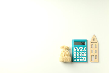 Concept of heating season with calculator on white background