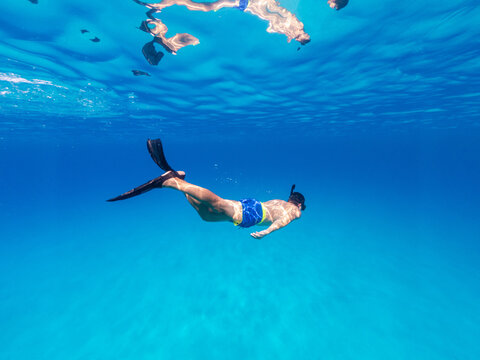 Underwater photo freediver swim in clear sea