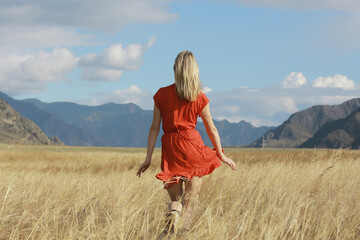 mountains travel field girl, freedom and happiness concept active