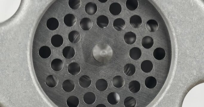 Close-up. Rotation of the electric mincer knife.