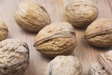Walnuts on the wood background. Close up.