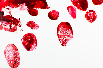 Red Bloody fingerprints on the white background. Horror and crime scene concept. Halloween postcard.