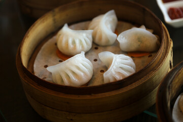 Traditional Chinese dumplings, served in a steamer box