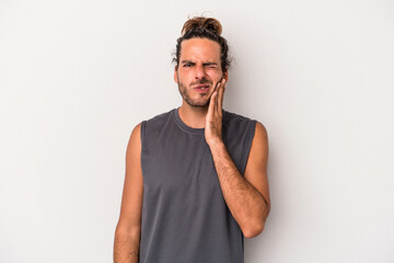 Fototapeta premium Young caucasian man isolated on gray background having a strong teeth pain, molar ache.