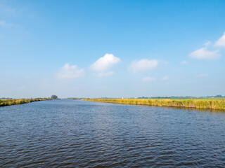 Water of Langweerder Vaart canal in Boornzwaag, Friesland, Netherlands
