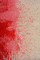 Red paint on a wall