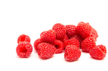 Appetizing red raspberries on a white background. Vitamins in raspberries