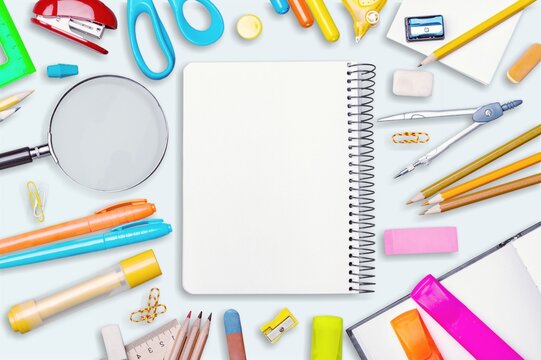 Back to School. School supplies sheet, pencil, scissors on a desk