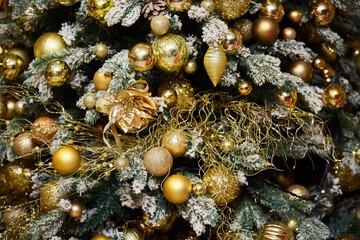 Elegant decorated with balls and figures Christmas tree