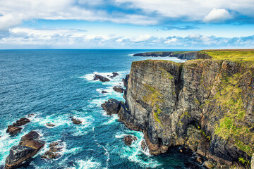 Beautiful view of blue ocean and clif in ireland © Bart