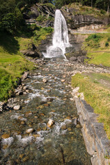 Steinsdalsfossen waterfall and landscape in Norway 