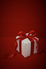 Gift box on red background