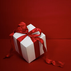 Gift box on red background