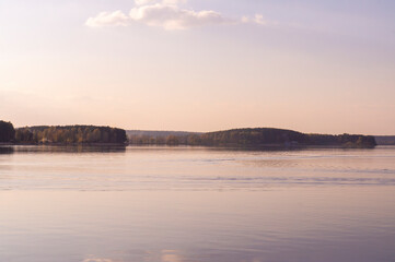 Calm gentle sunset on the sea without wind