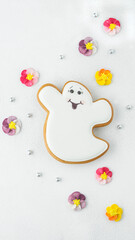abstract background with gingerbread in the shape of a ghost for halloween
