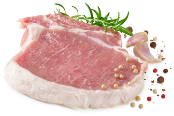 sliced raw pork meat with rosemar, garlic and peppercorn isolated on white background. Clipping path and full depth of field
