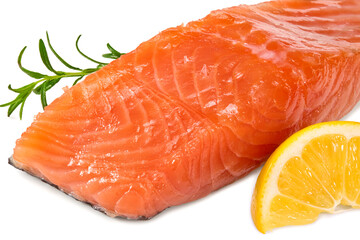 Red fish. Raw salmon fillet with rosemary, peppercorns and lemon isolate on white background. Clipping path and full depth of field