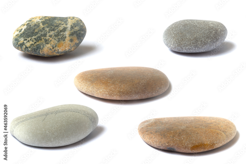 Poster a set of stones with a shadow isolated on a white background