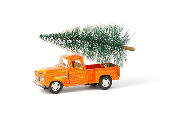 car with christmas tree isolated on white