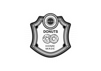 premium VINTAGE Donuts logo or doughnut logo. Cafe or bakery emblem