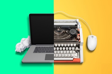 Old vs new technology. Modern computer and typewriter