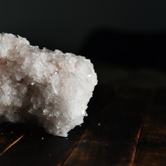 the crystals of crude sea salt are transparent with a pink tinge