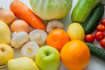 Fruits and vegetables are lying next to each other. . High quality photo