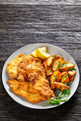 crispy Chicken Cutlets with spicy roasted potatoes
