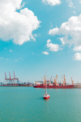  A large pleasure yacht with people moors to the pier on a sunny day. Marine Station. High quality photo