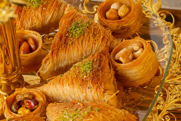 Variety of Turkish desserts served on cake stand