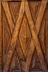 Wooden panels of a vintage door. Vector wood texture background