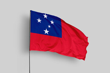 Samoa flag isolated on the blue sky background. close up waving flag of Samoa. flag symbols of Samoa. Concept of Samoa.