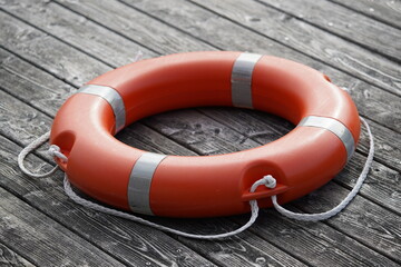 life buoy on wooden deck