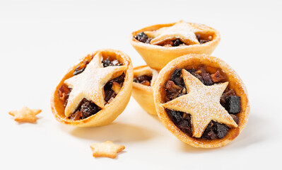 Traditional British Christmas pastry Mince Pies with apple, raisins, nuts filling. 