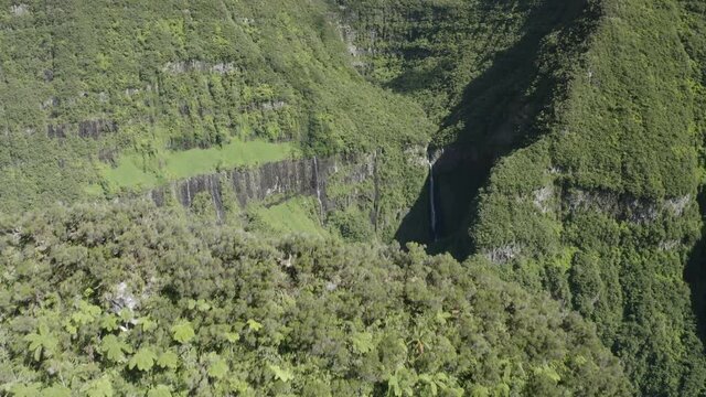 Aerial view of Cascade du trou de for, a beautiful waterfall near Bras Panon, Saint Benoit, Reunion.
