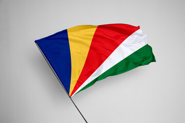 Seychelles flag isolated on white background. close up waving flag of Seychelles. flag symbols of Seychelles. Concept of Seychelles.