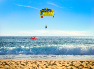 Parasailing over sea