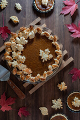 Top down view of a homemade decorated pumpkin pie for Thanksgiving.