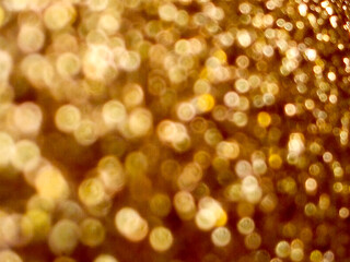 phụ̄̂n h̄lạng nāmṭhrrm
blurry golden bokeh light texture as an abstract background