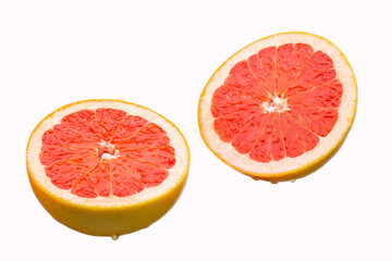Fresh grapefruit slices, isolated on a white background