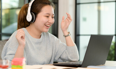 Teenager girl chatting online having fun.