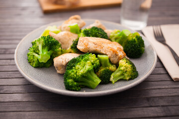 healthy appetizer of chicken pieces with broccoli in bowl for healthy breakfast