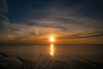 Fototapeta na wymiar Sunset on the beach of Ahrenshoop in Germany